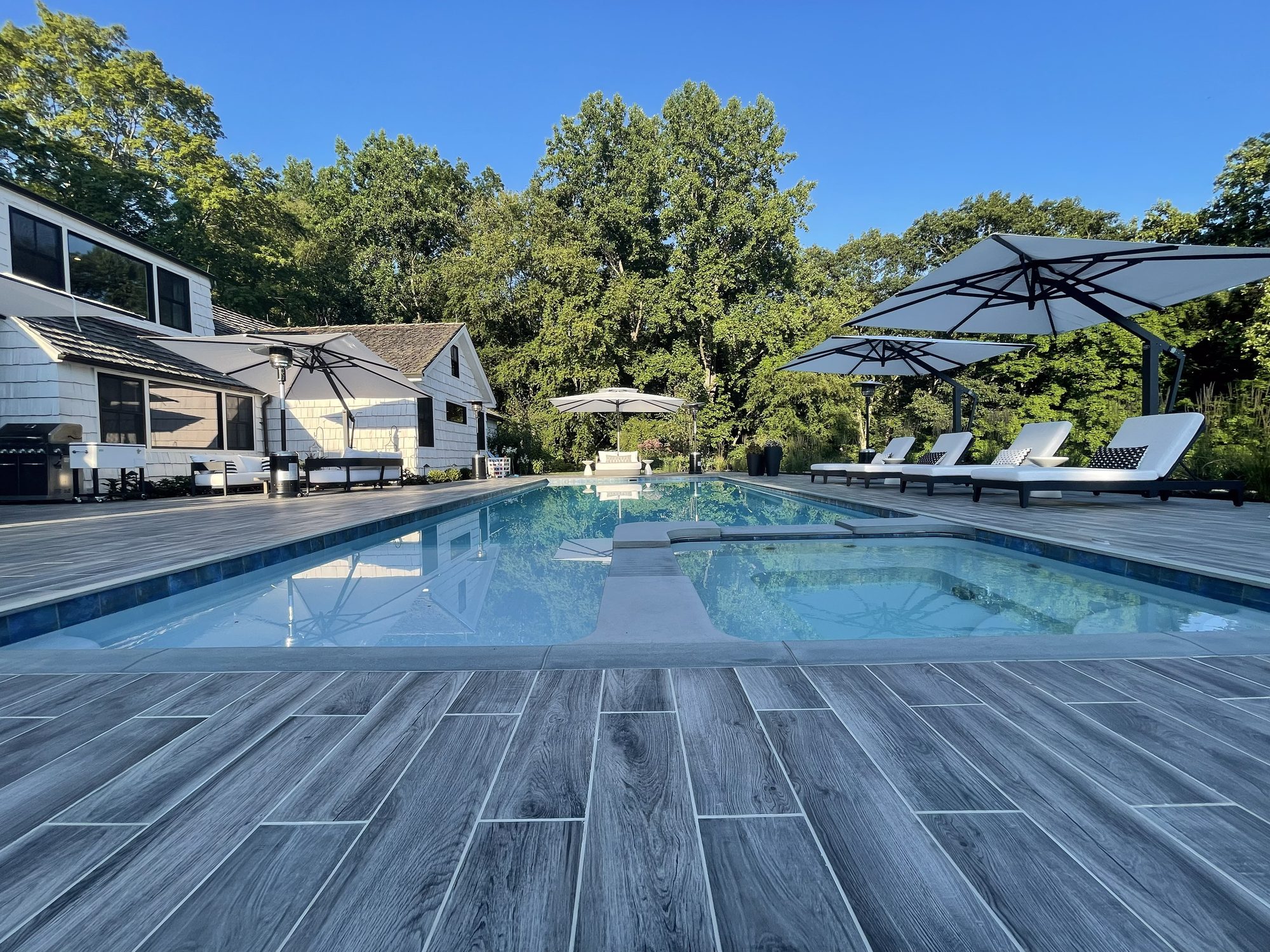 Pool and retaining wall on sloped rear yard