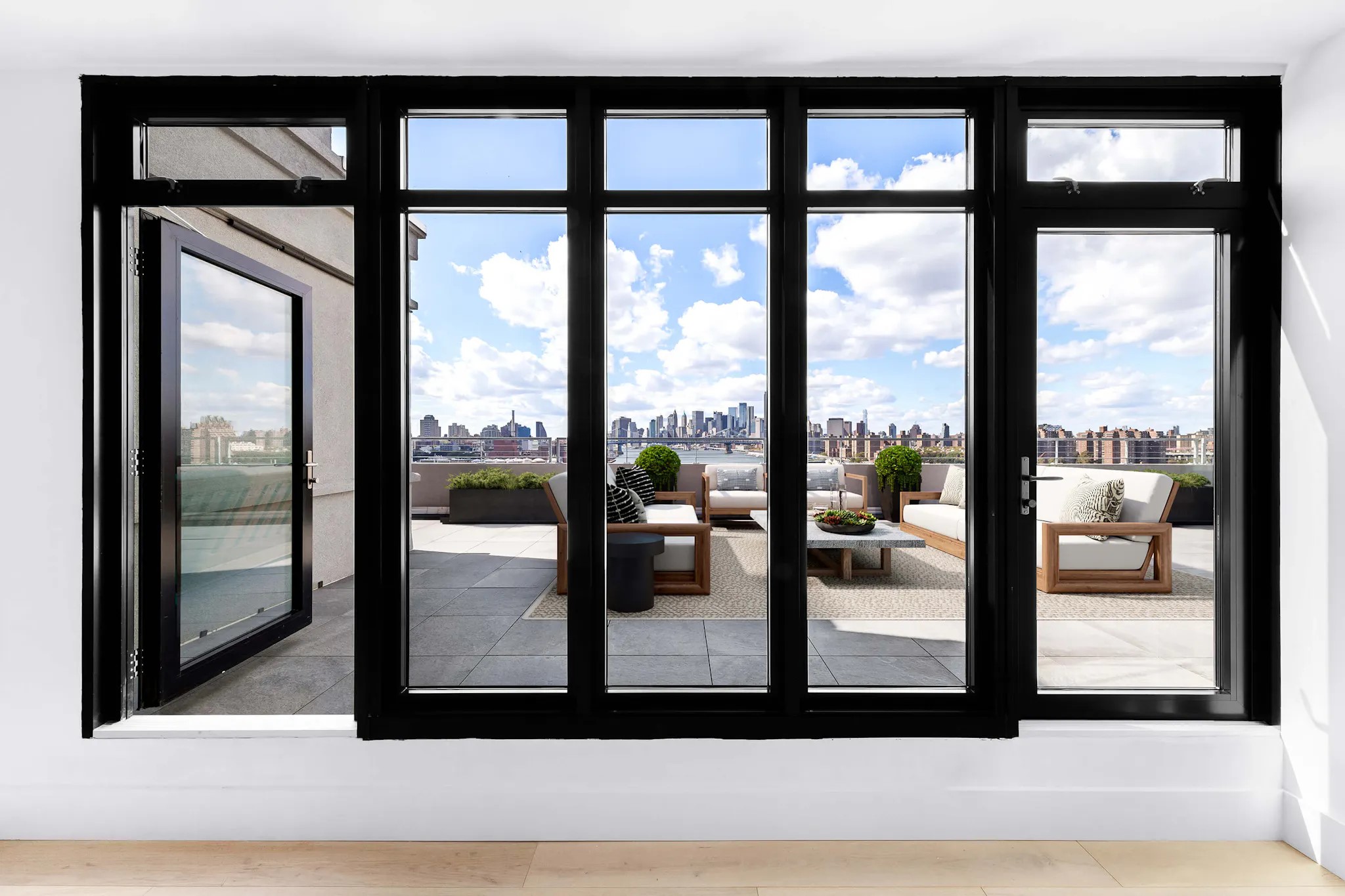 Steel-framed windows and doors to rooftop terrace